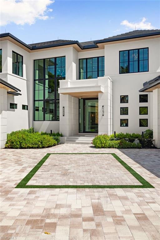 2345 Tarpon Road Naples, FL 34102 - Photo 39 of 43 Entrance to property with stucco siding