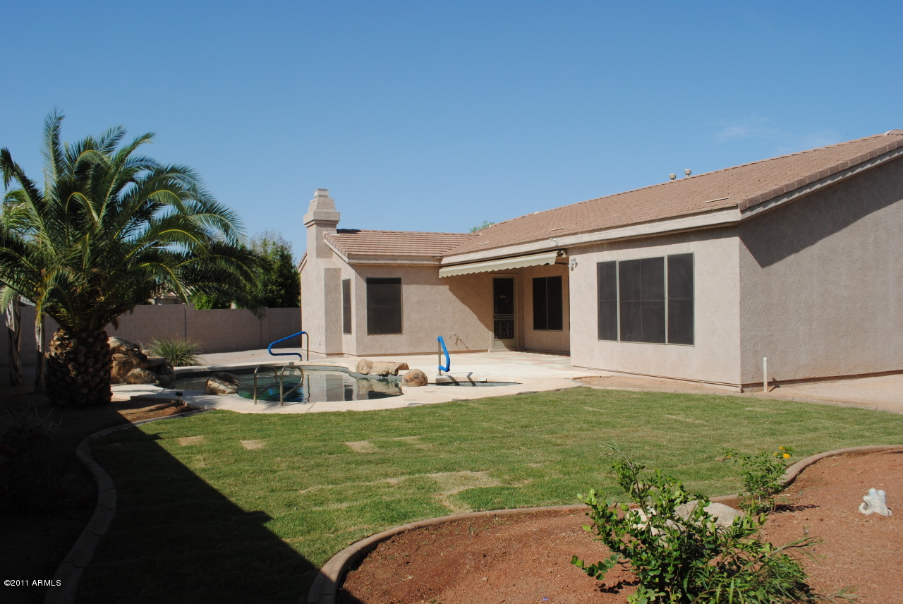 13315 West Coronado Road Goodyear, AZ 85395 - Photo 10 of 10 Backyard Grassy Area