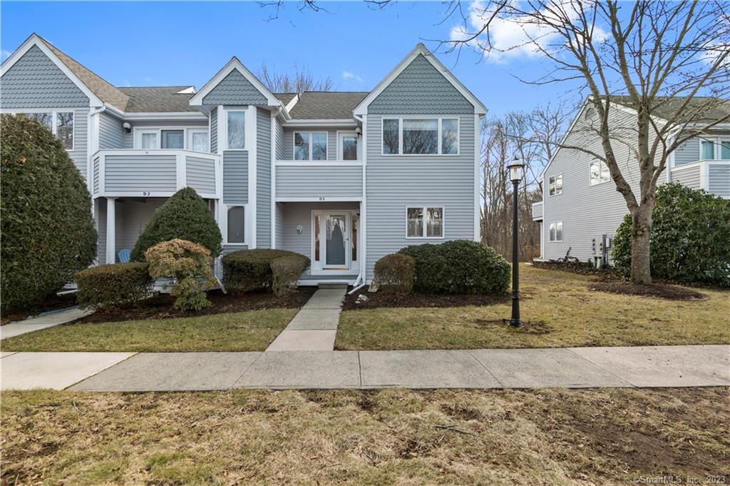 59 Old Post Road, Unit D3 Clinton, CT 06413 - Photo 1 of 1 a front view of a house with garden