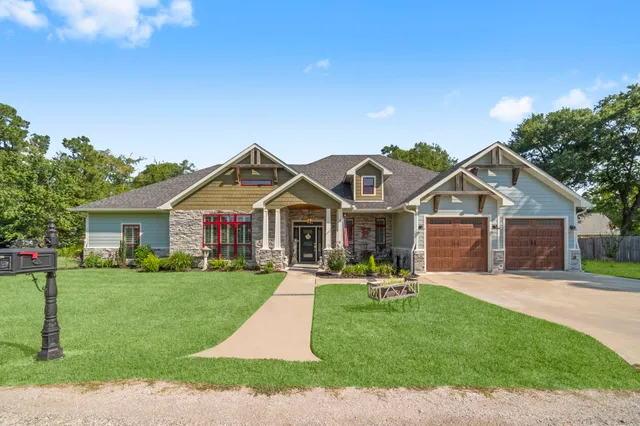 a front view of a house with a porch