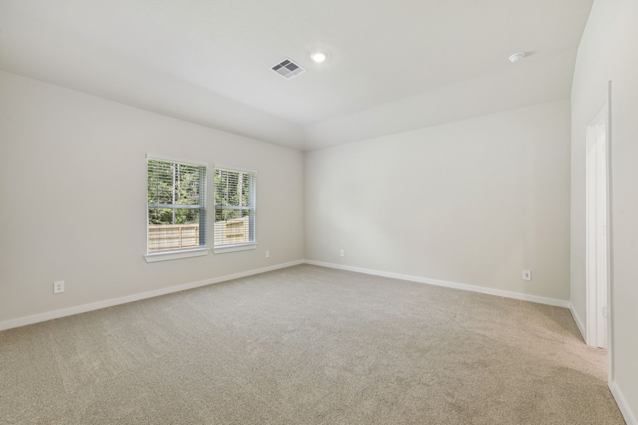1653 Hopson Ranch Drive Conroe, TX 77301 - Photo 15 of 38 an empty room with windows