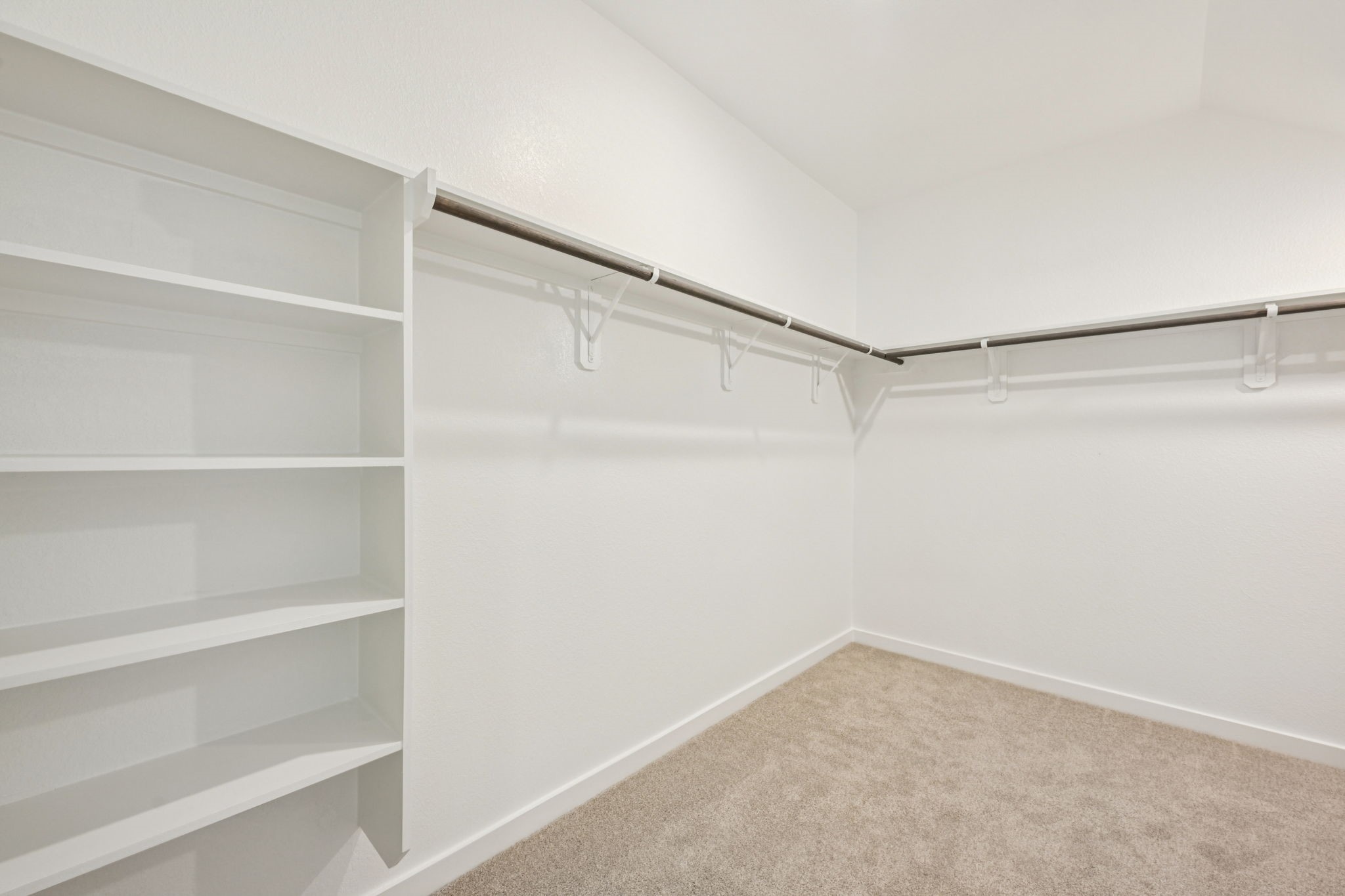 1653 Hopson Ranch Drive Conroe, TX 77301 - Photo 21 of 38 a view of an empty walk in closet