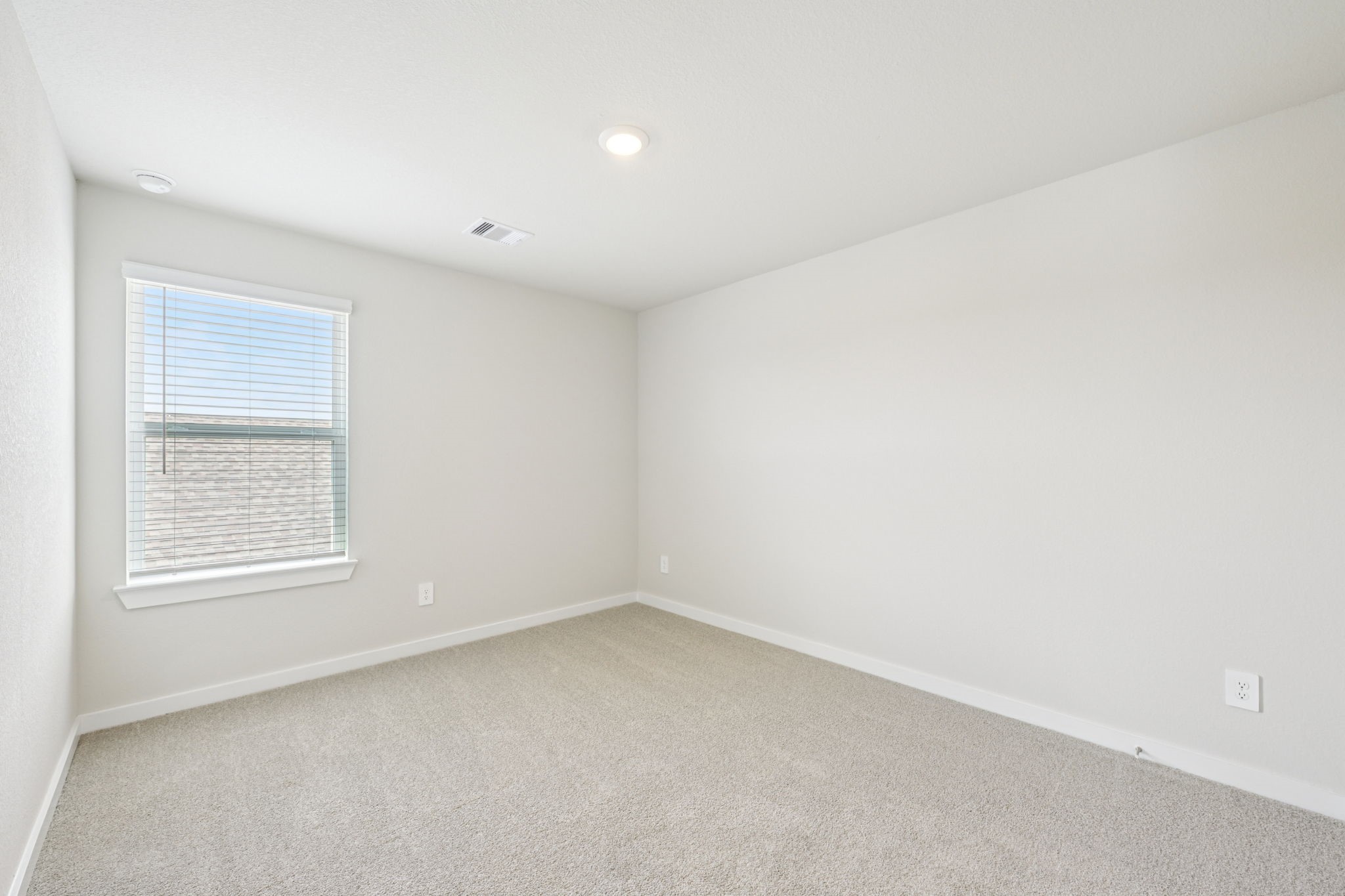 1653 Hopson Ranch Drive Conroe, TX 77301 - Photo 30 of 38 an empty room with a window