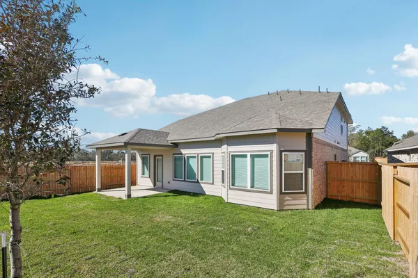 a view of outdoor space yard and front view of a house