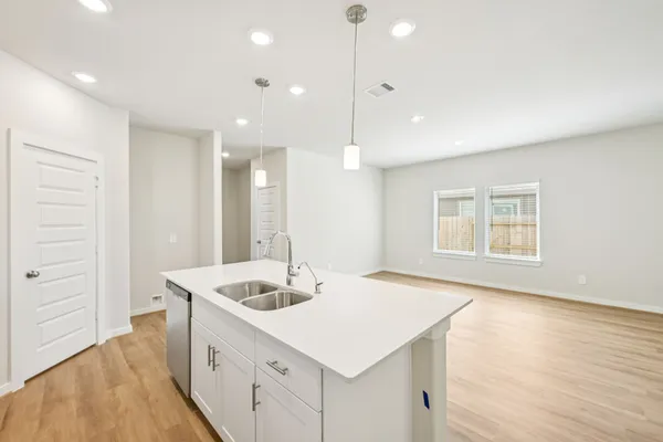 a bathroom with a sink double vanity and a mirror