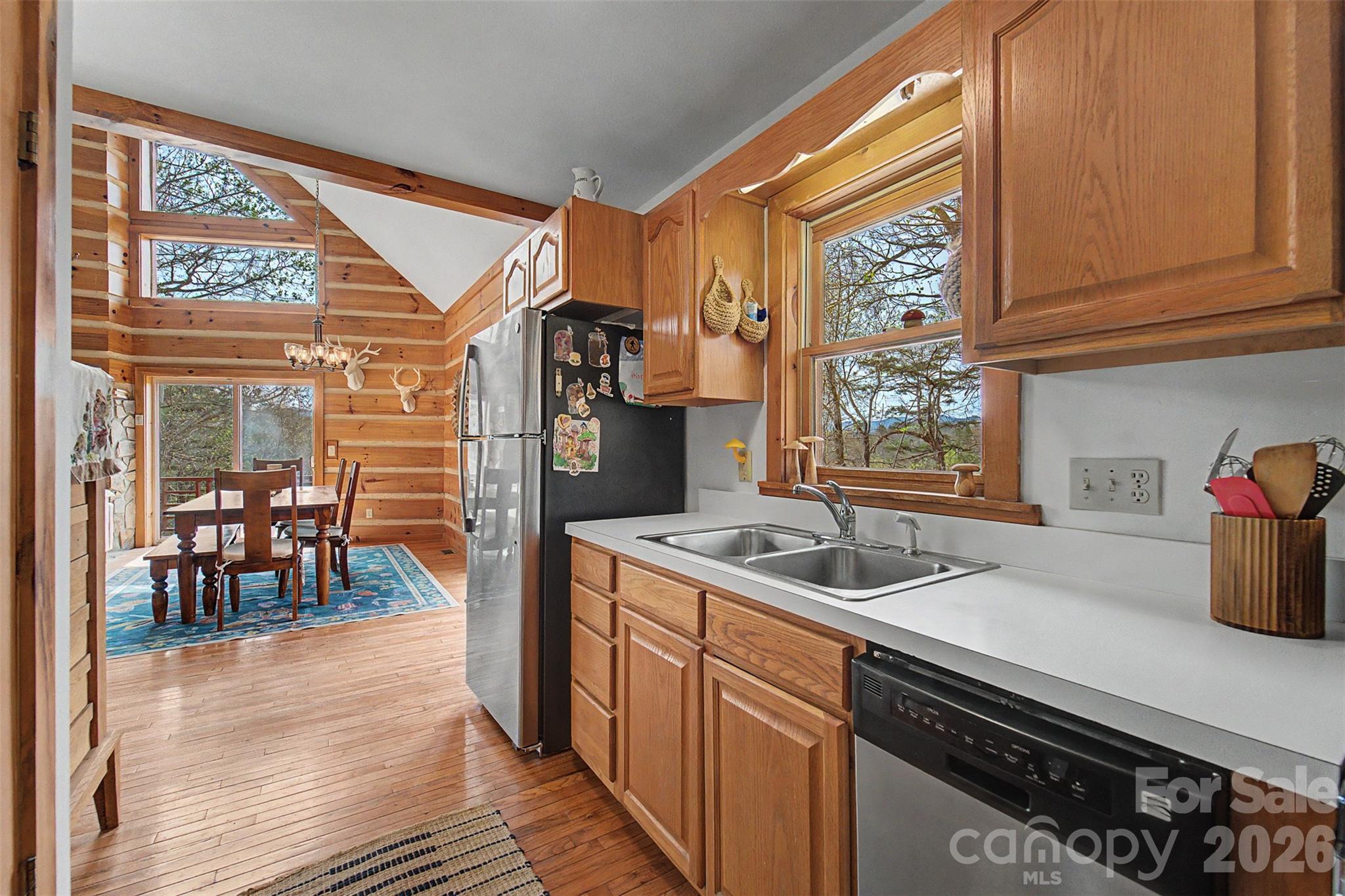 183 Ridge Place Bryson City, NC 28713 - Photo 17 of 44 a kitchen that has a sink and a stove