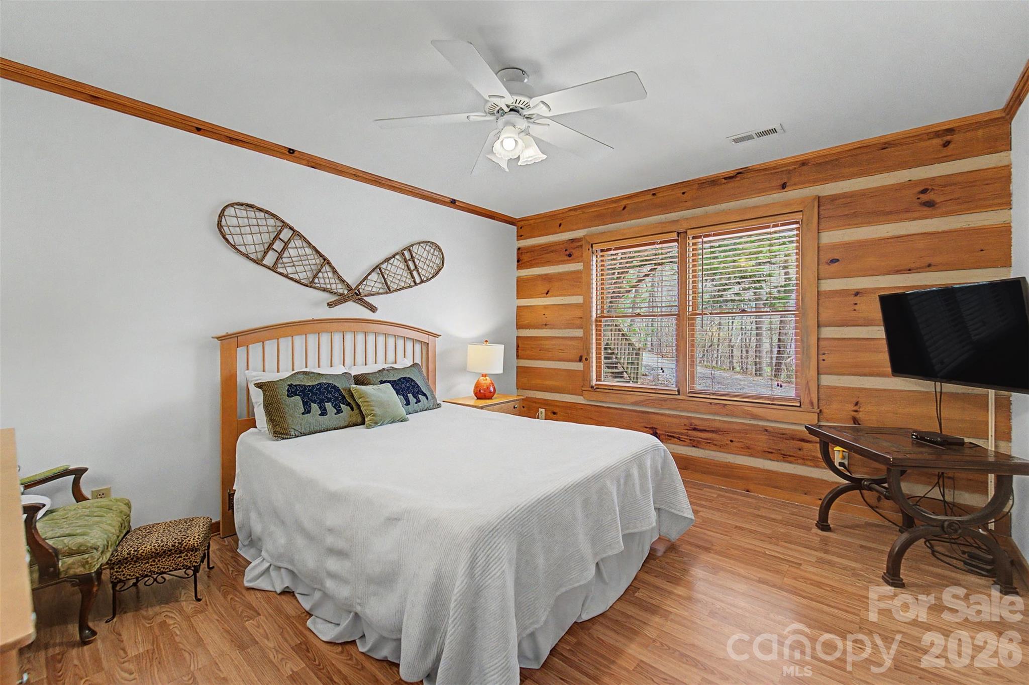 183 Ridge Place Bryson City, NC 28713 - Photo 18 of 44 a bedroom with a bed and a table in it