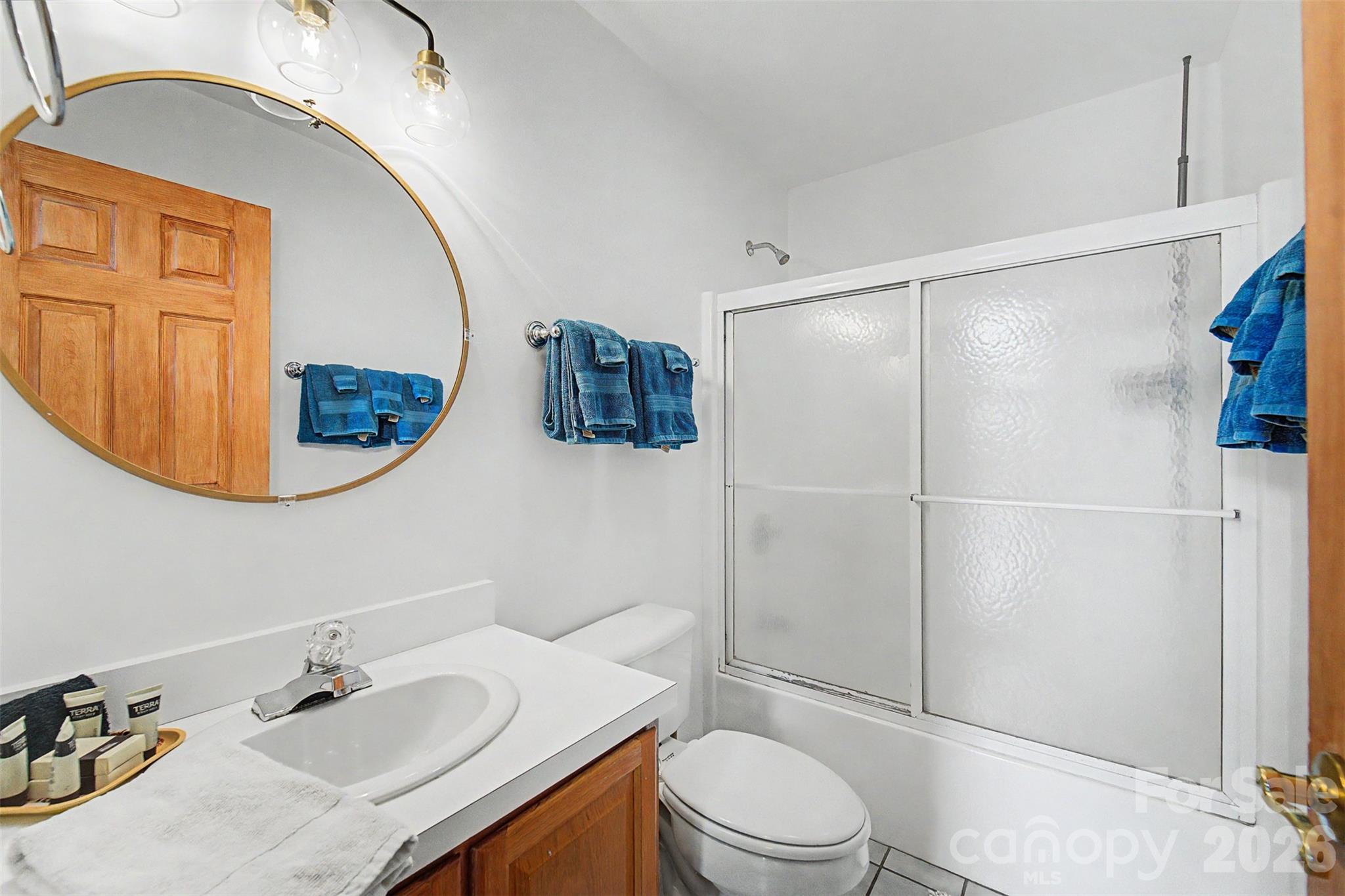183 Ridge Place Bryson City, NC 28713 - Photo 20 of 44 a bathroom with a sink toilet and shower