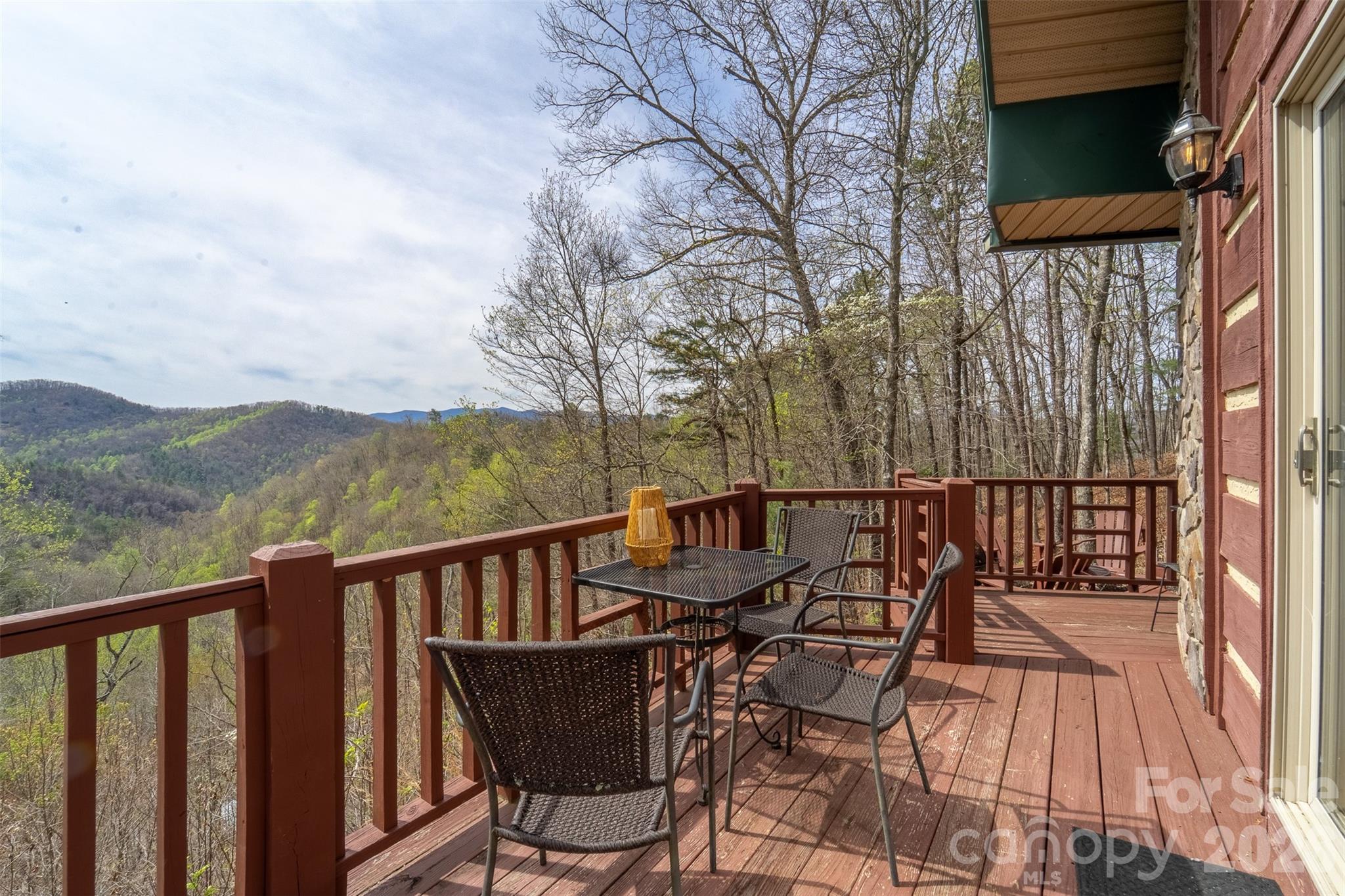 183 Ridge Place Bryson City, NC 28713 - Photo 27 of 44 a view of a balcony with mountain view and wooden floor
