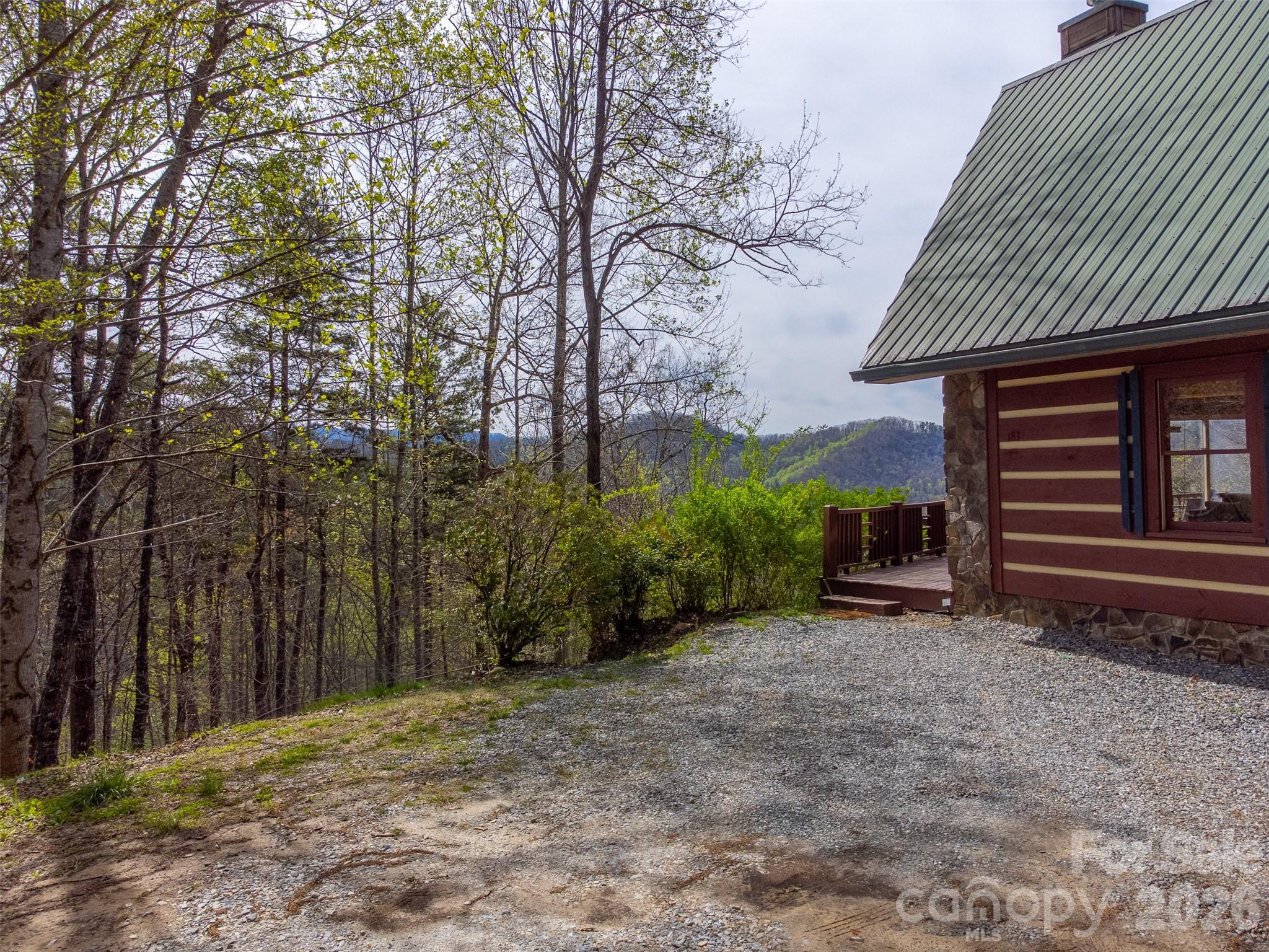 183 Ridge Place Bryson City, NC 28713 - Photo 35 of 44 a view of a house with a yard