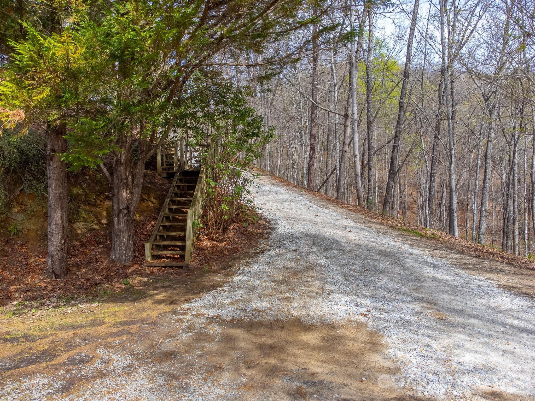 183 Ridge Place Bryson City, NC 28713 - Photo 37 of 44 a view of a wooden fence and trees