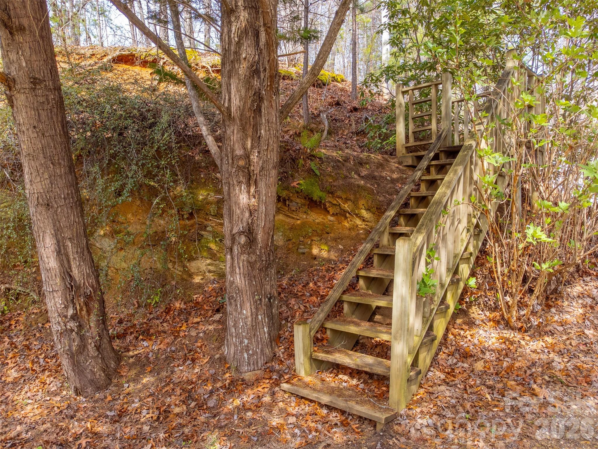 183 Ridge Place Bryson City, NC 28713 - Photo 38 of 44 a view of stairs and wooden fence