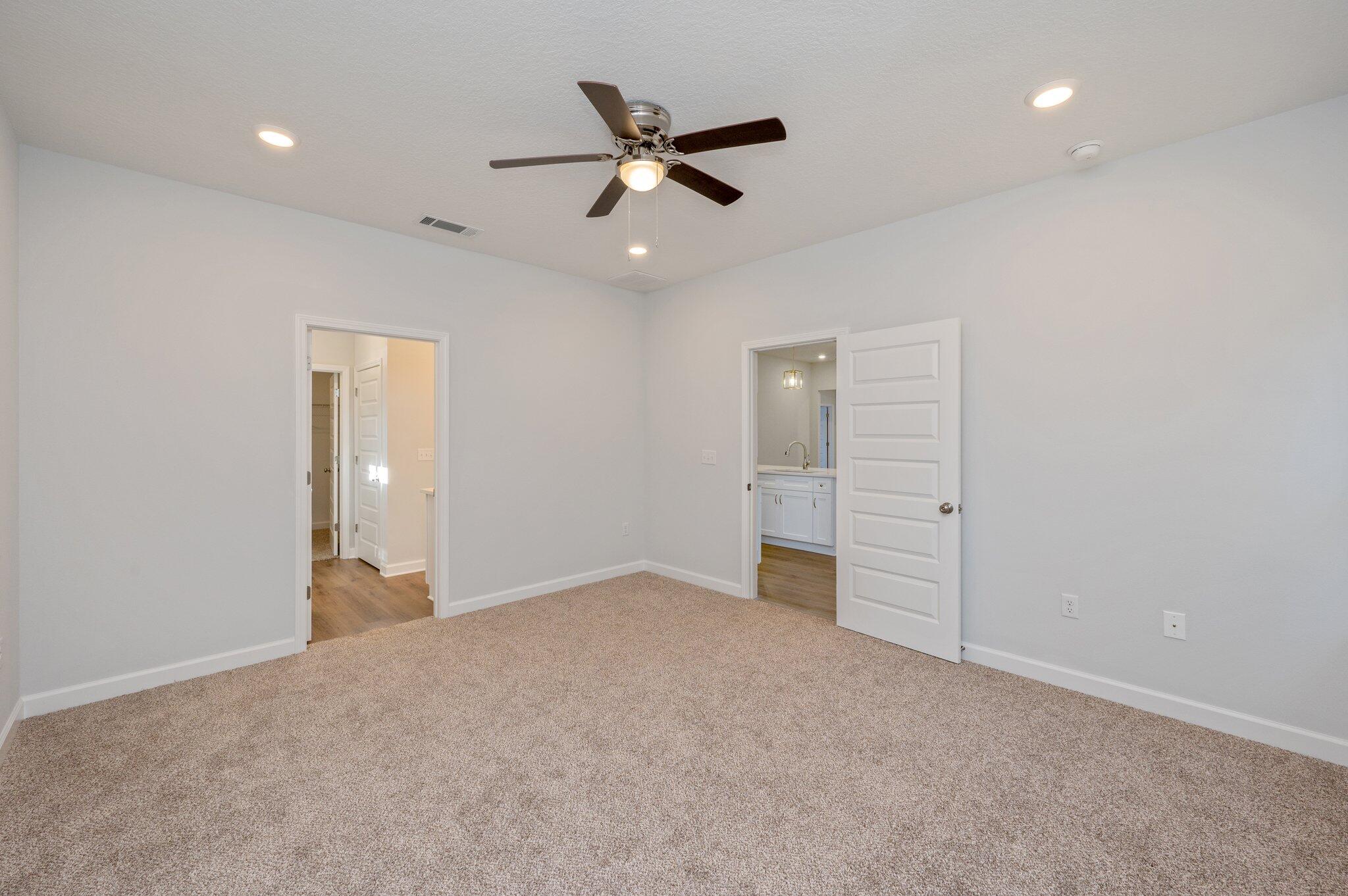2614 Sorrel Ridge Road Crestview, FL 32536 - Photo 17 of 35 an empty room with closet and ceiling fan