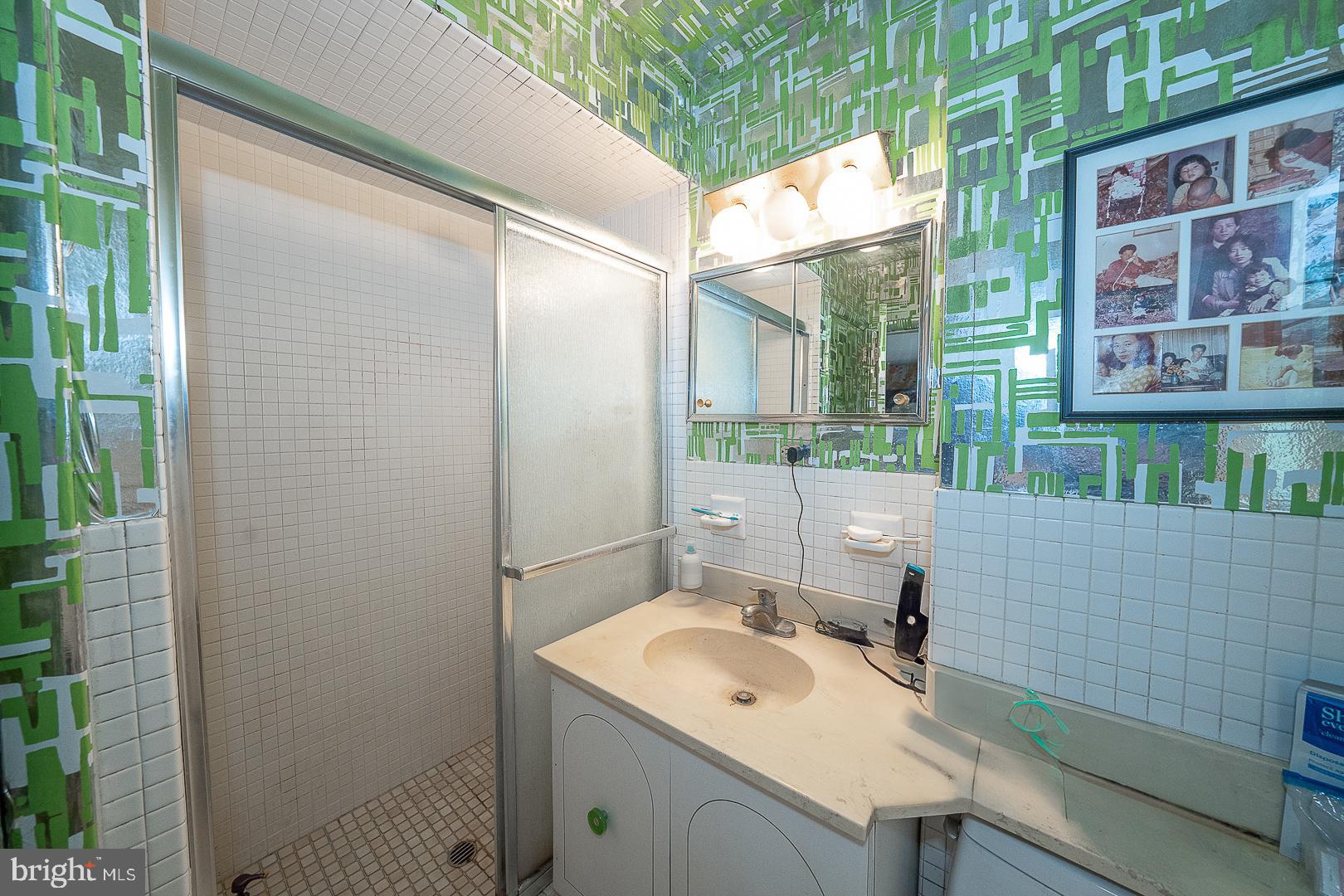 323 Hidden River Road Penn Valley, PA 19072 - Photo 12 of 29 a bathroom with a sink and a mirror