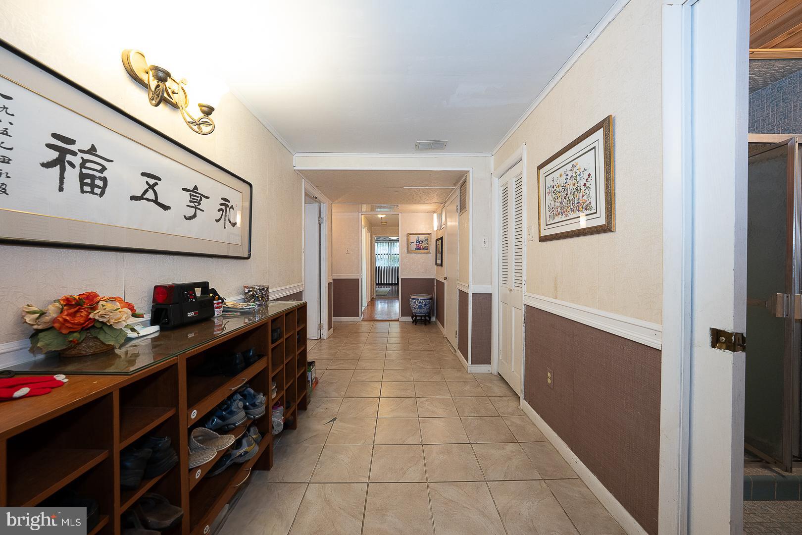 323 Hidden River Road Penn Valley, PA 19072 - Photo 13 of 29 a view of a hallway with workspace