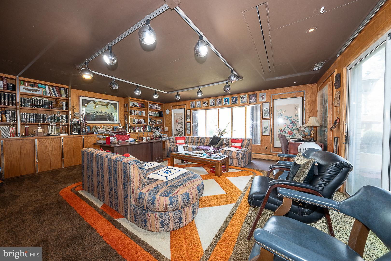 323 Hidden River Road Penn Valley, PA 19072 - Photo 20 of 29 a very nice looking living room with furniture and a large window