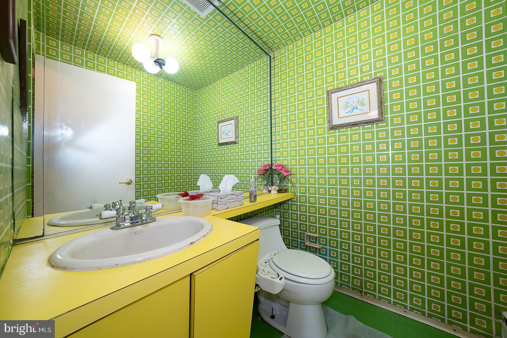 323 Hidden River Road Penn Valley, PA 19072 - Photo 25 of 29 a bathroom with a sink mirror toilet and shower