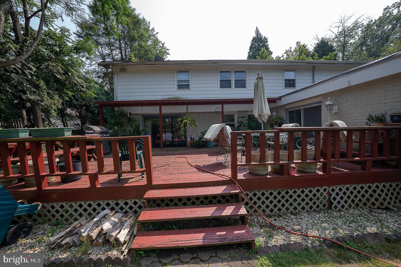 323 Hidden River Road Penn Valley, PA 19072 - Photo 27 of 29 a view of a chairs and table on the deck