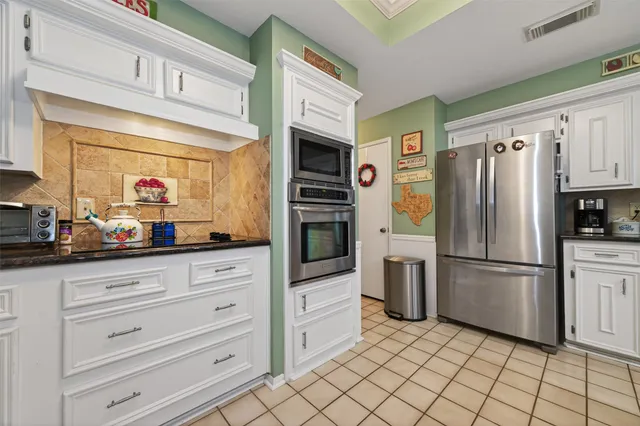 a room with furniture and a flat screen tv