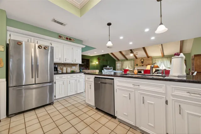 a bedroom with a bed and furniture