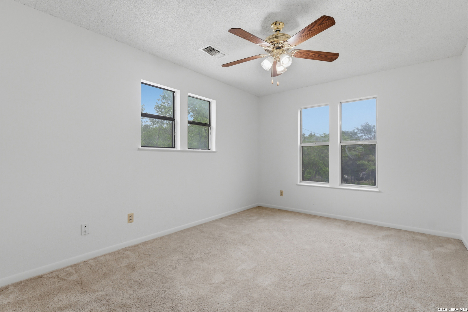 261 Fawn Lane Spring Branch, TX 78070 - Photo 22 of 44 an empty room with a window