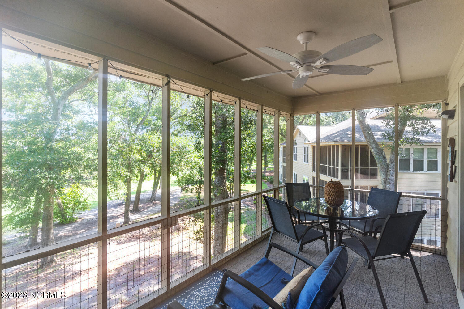 223 Clubhouse Road, Unit 606 Sunset Beach, NC 28468 - Photo 29 of 42 Screened Porch