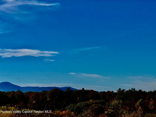 a view of lake and mountain