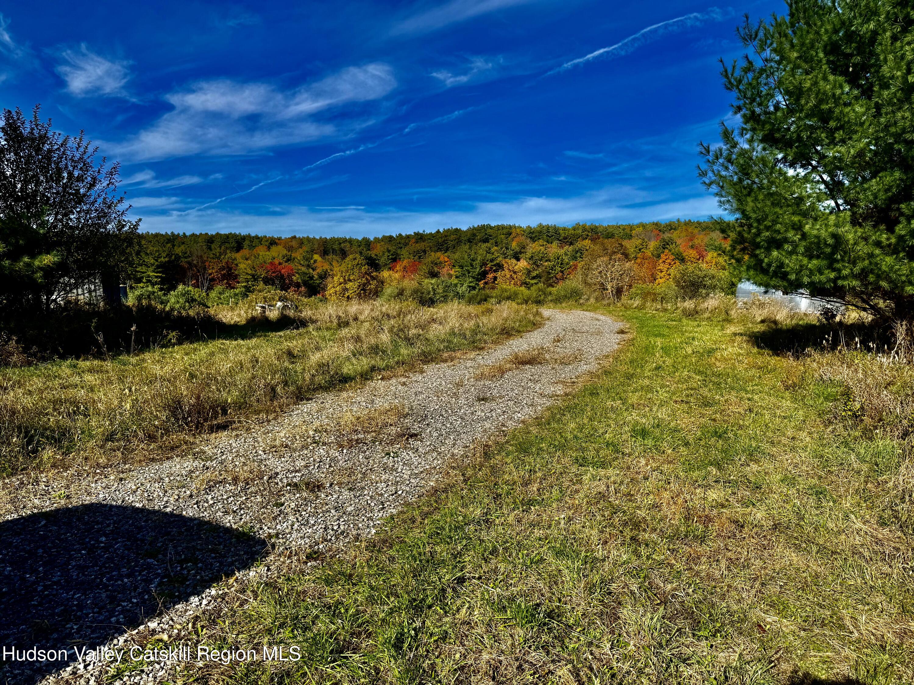 114 Old Barrington Road Hudson, NY 12534 - Photo 8 of 30 a view of a yard with wooden fence