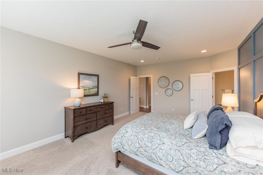 2041 Jaycox Road Avon, OH 44011 - Photo 30 of 50 Bedroom featuring light colored carpet, recessed lighting, and ceiling fan