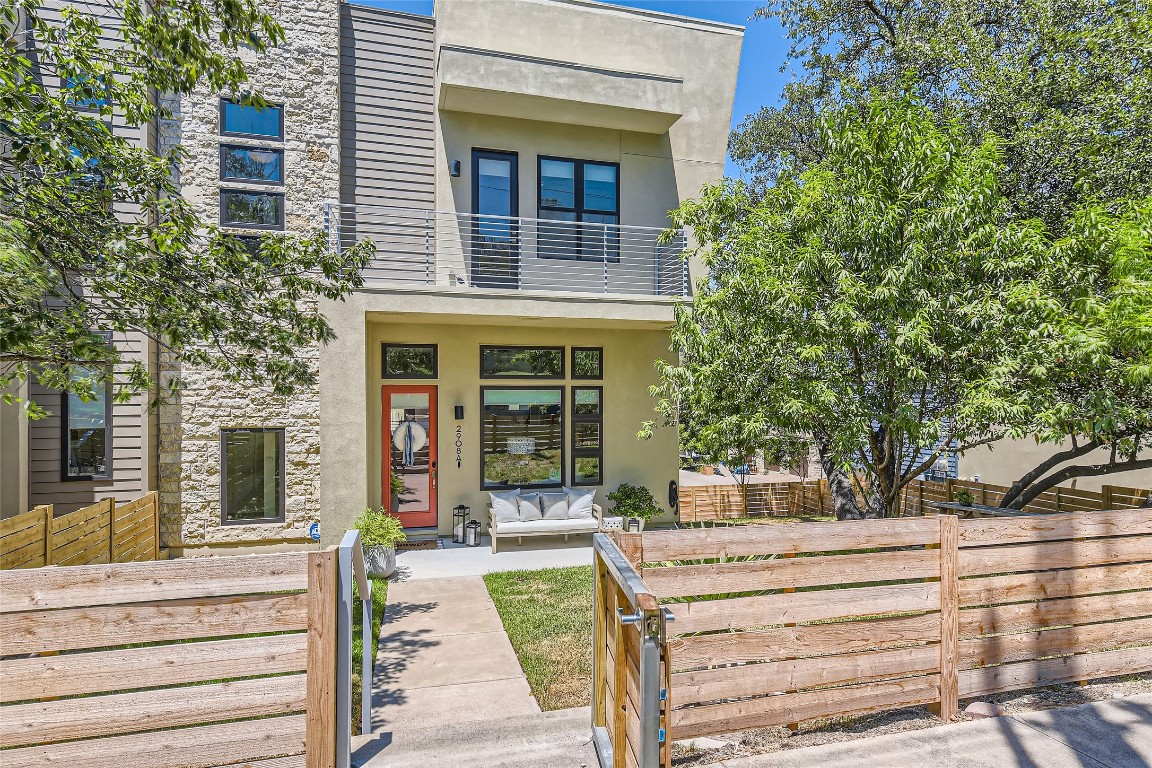 2908 South 5th Street, Unit A Austin, TX 78704 - Photo 1 of 1 a view of a brick house with large windows