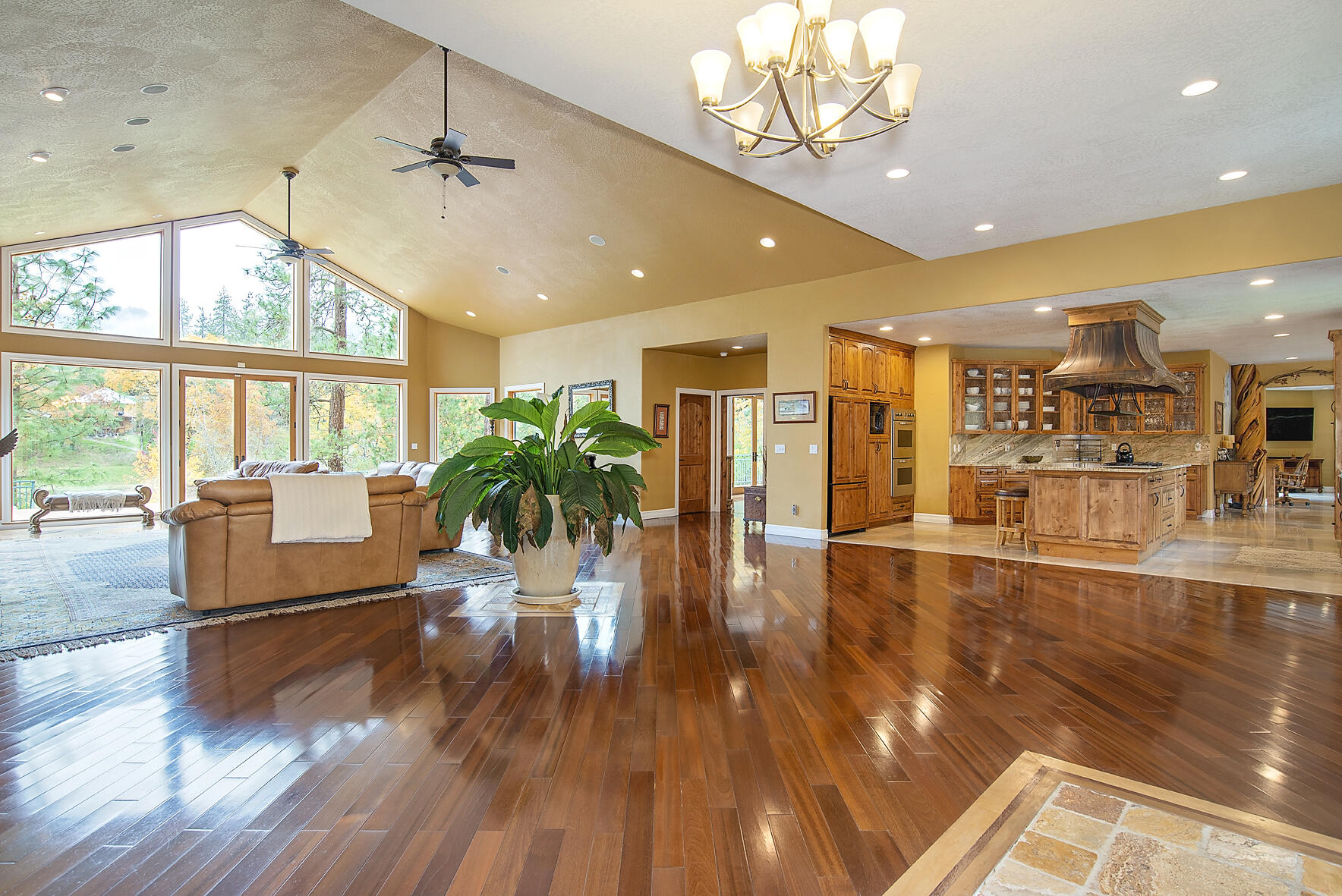 1665 Upper River Road Gold Hill, OR 97525 - Photo 5 of 48 a view of a living room and a kitchen with a large window