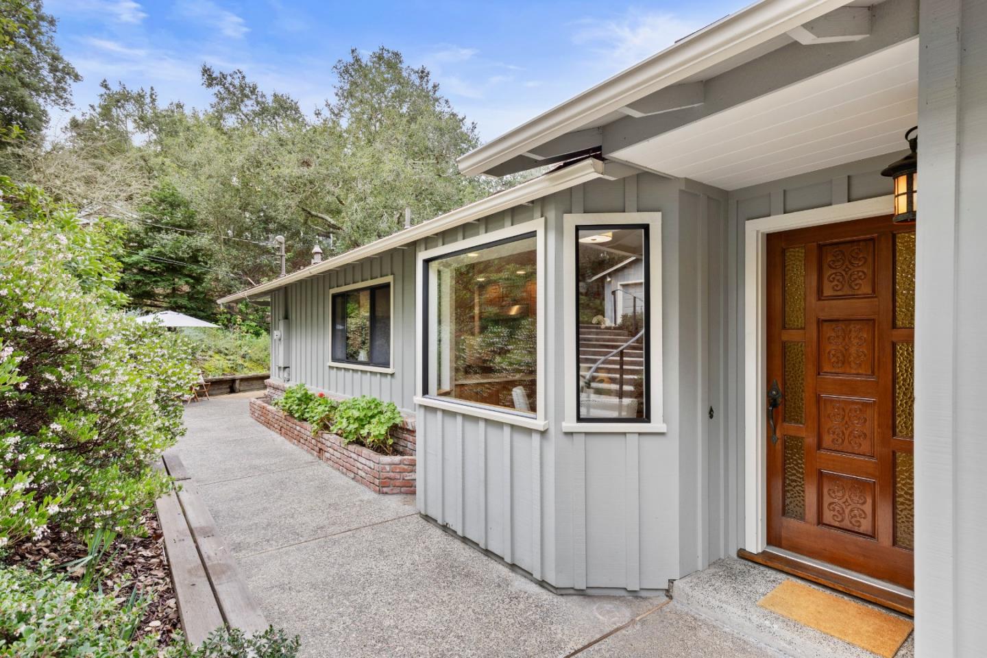 460 Aspen Way Los Altos, CA 94024 - Photo 1 of 30 front view of a house with potted plants