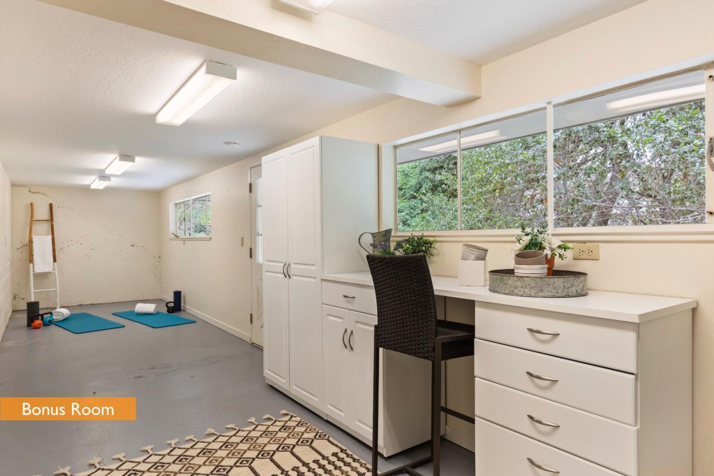 460 Aspen Way Los Altos, CA 94024 - Photo 28 of 30 a dining hall with stainless steel appliances granite countertop a stove a sink dishwasher and a dining table with wooden floor