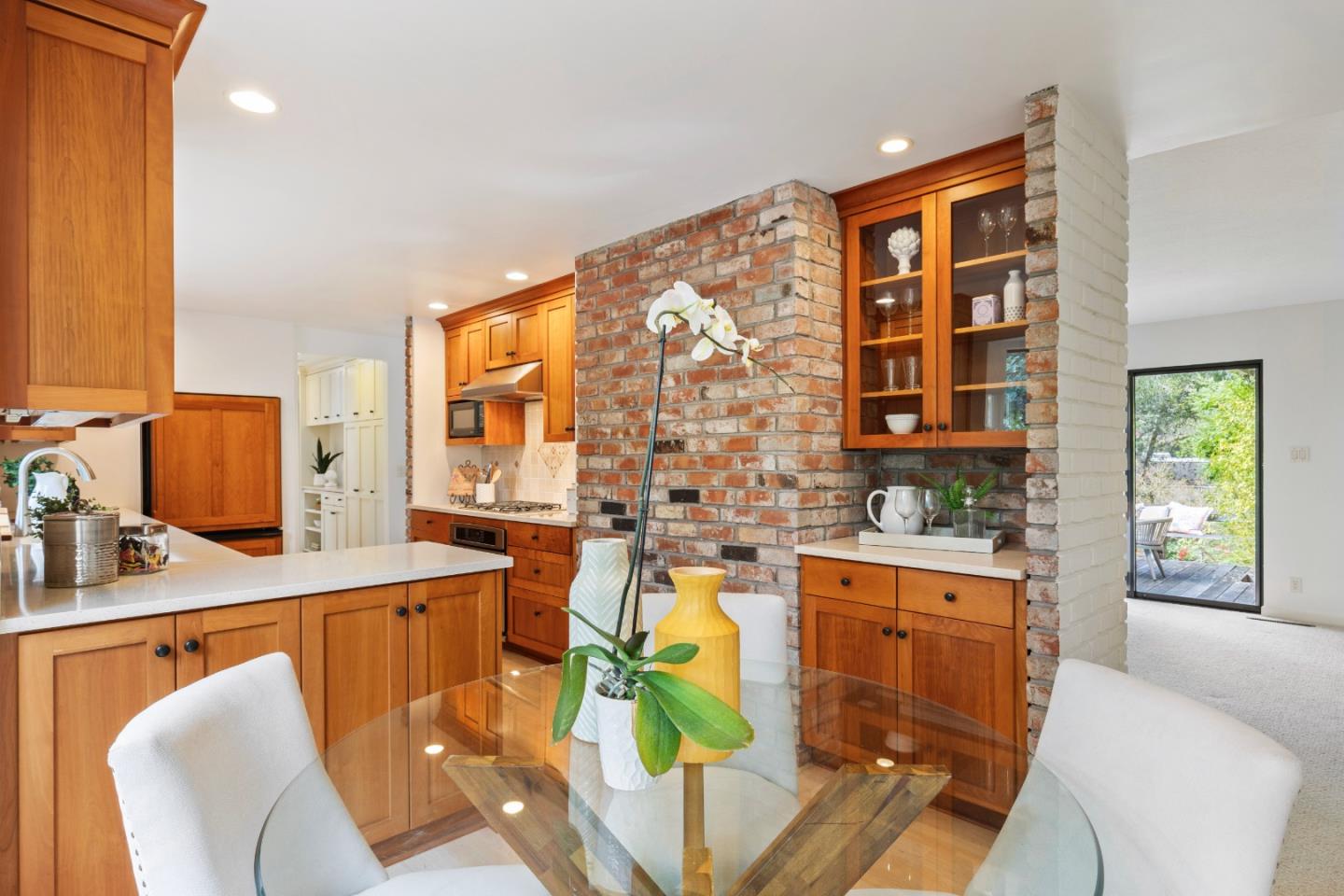 460 Aspen Way Los Altos, CA 94024 - Photo 8 of 30 a living room with stainless steel appliances furniture a rug and a large window