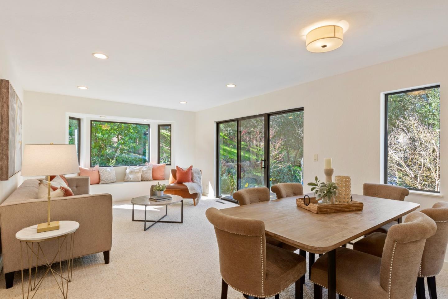 460 Aspen Way Los Altos, CA 94024 - Photo 9 of 30 a living room with furniture and a large window