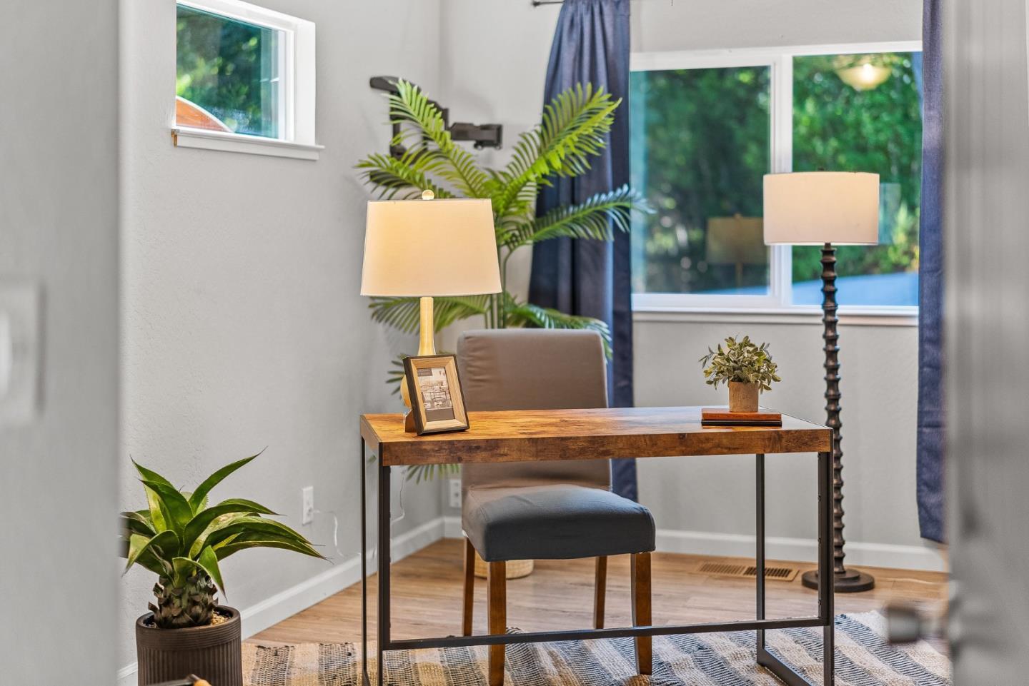 12 Crescent Drive Scotts Valley, CA 95066 - Photo 19 of 61 a table with a potted plant and a window