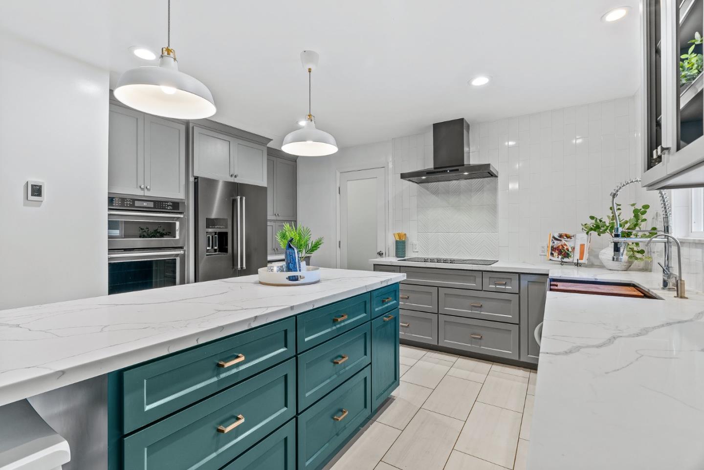 12 Crescent Drive Scotts Valley, CA 95066 - Photo 10 of 61 a kitchen with stainless steel appliances a sink stove and refrigerator