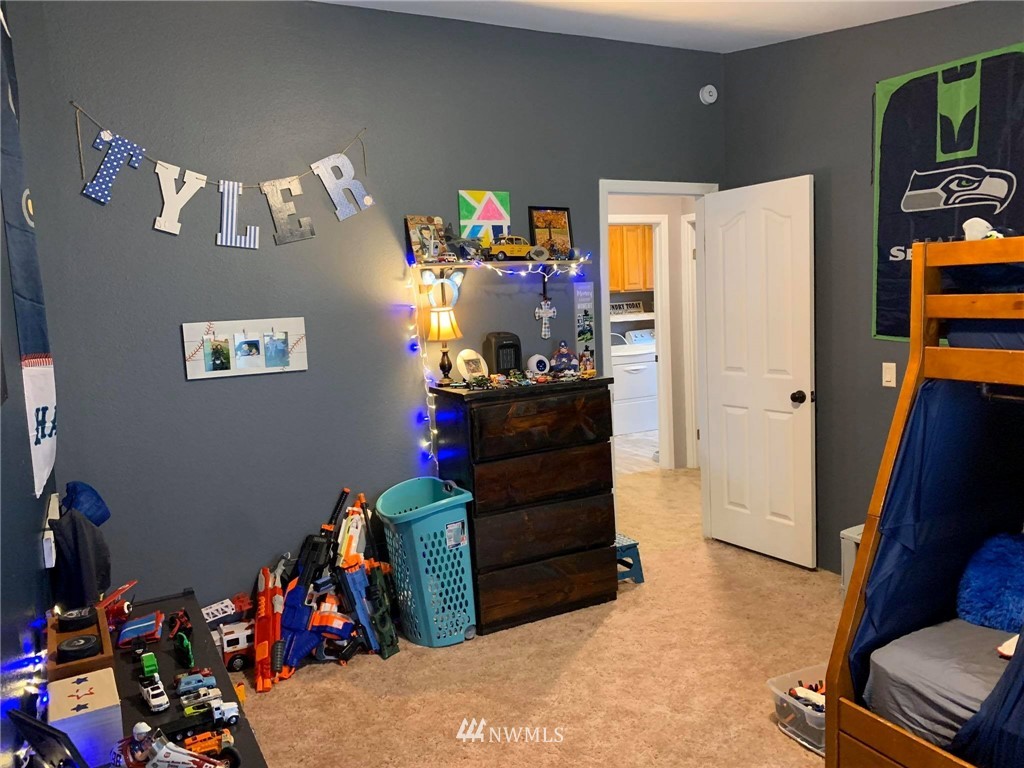 1769 Pangborn Road Lynden, WA 98264 - Photo 23 of 37 a bedroom with furniture and a bed