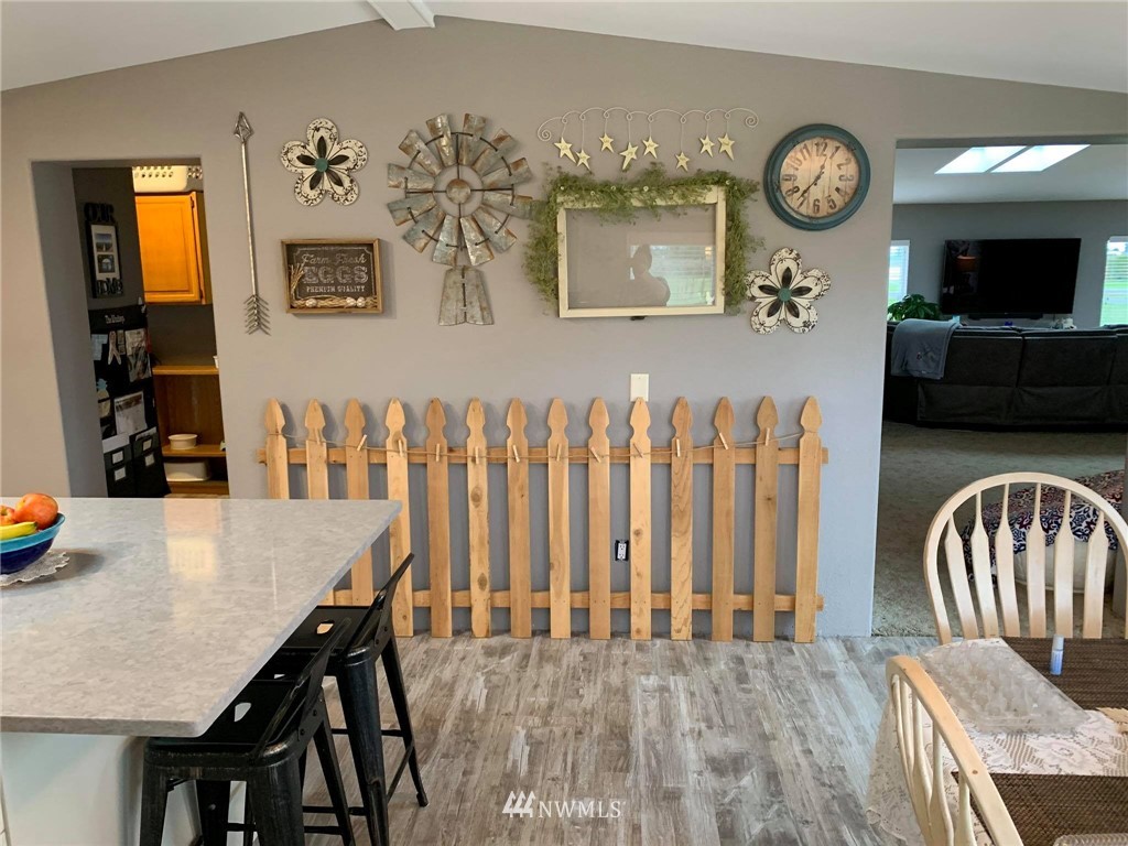 1769 Pangborn Road Lynden, WA 98264 - Photo 6 of 37 a view of a dining room with furniture and wooden floor