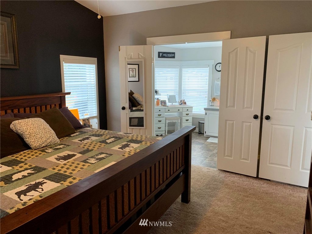 1769 Pangborn Road Lynden, WA 98264 - Photo 7 of 37 a bedroom with a bed and dresser