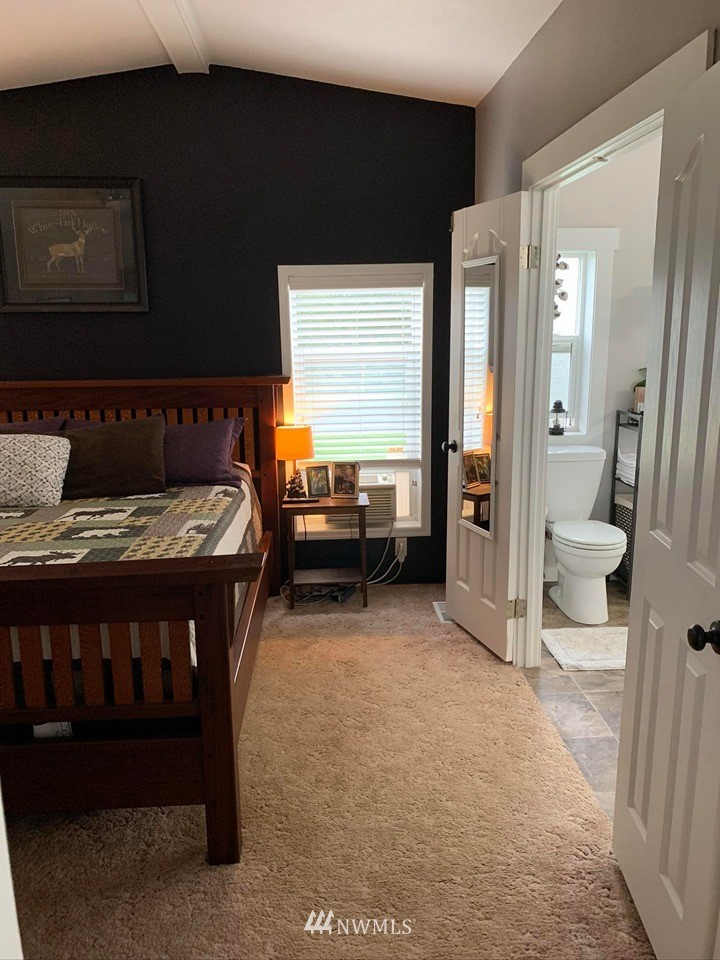 1769 Pangborn Road Lynden, WA 98264 - Photo 9 of 37 a view of a bedroom with furniture and windows