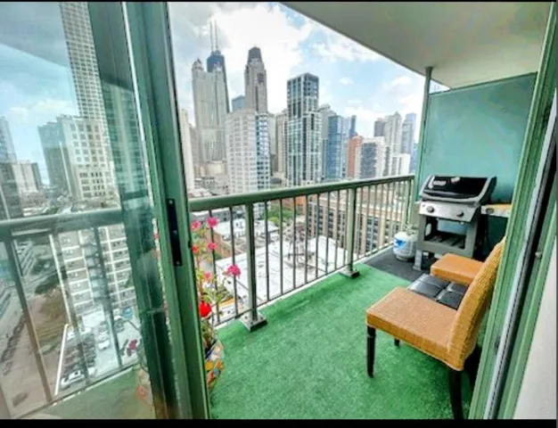 a view of a balcony with city view