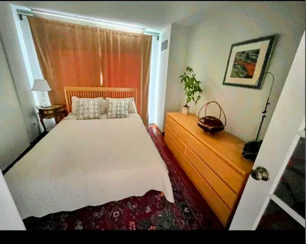 a kitchen with granite countertop a stove and a sink