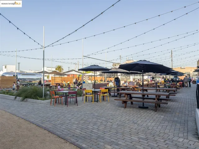 a view of a swimming pool with a lawn chairs