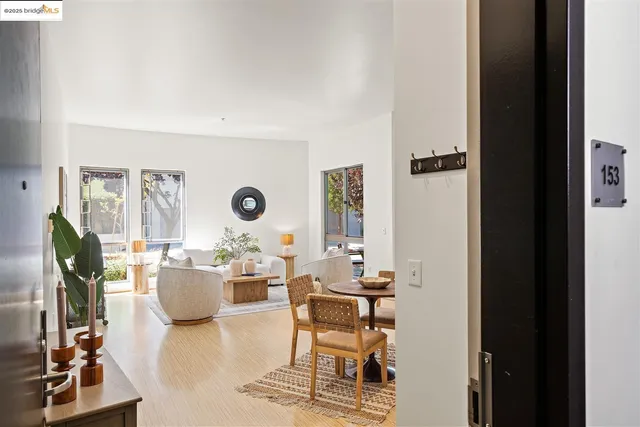 a living room with lots of furniture and a window