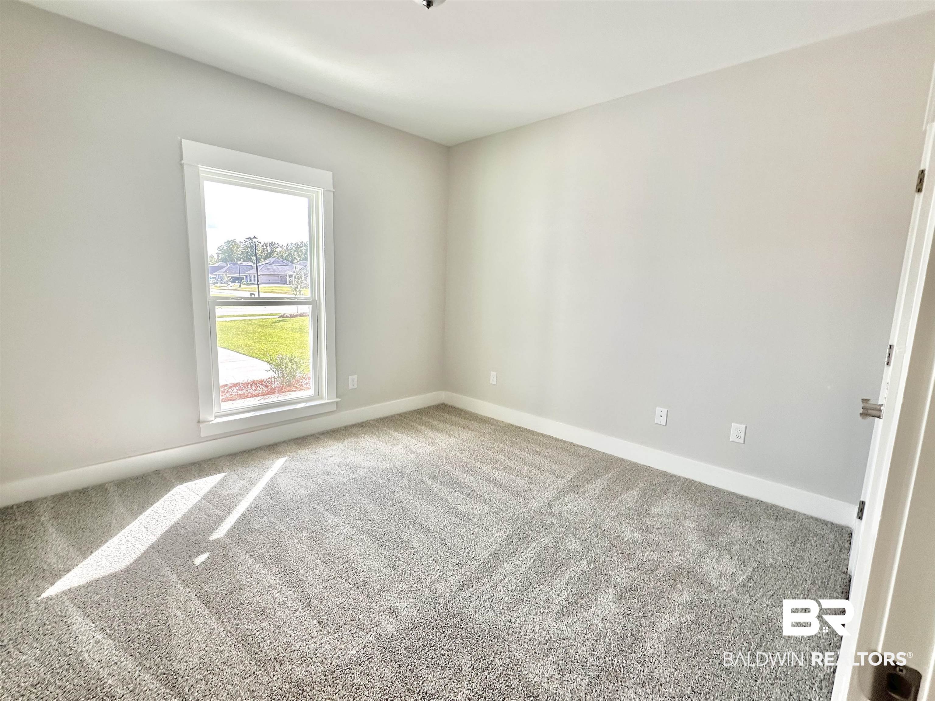 634 Kitfox Avenue Fairhope, AL 36532 - Photo 11 of 33 View of carpeted spare room