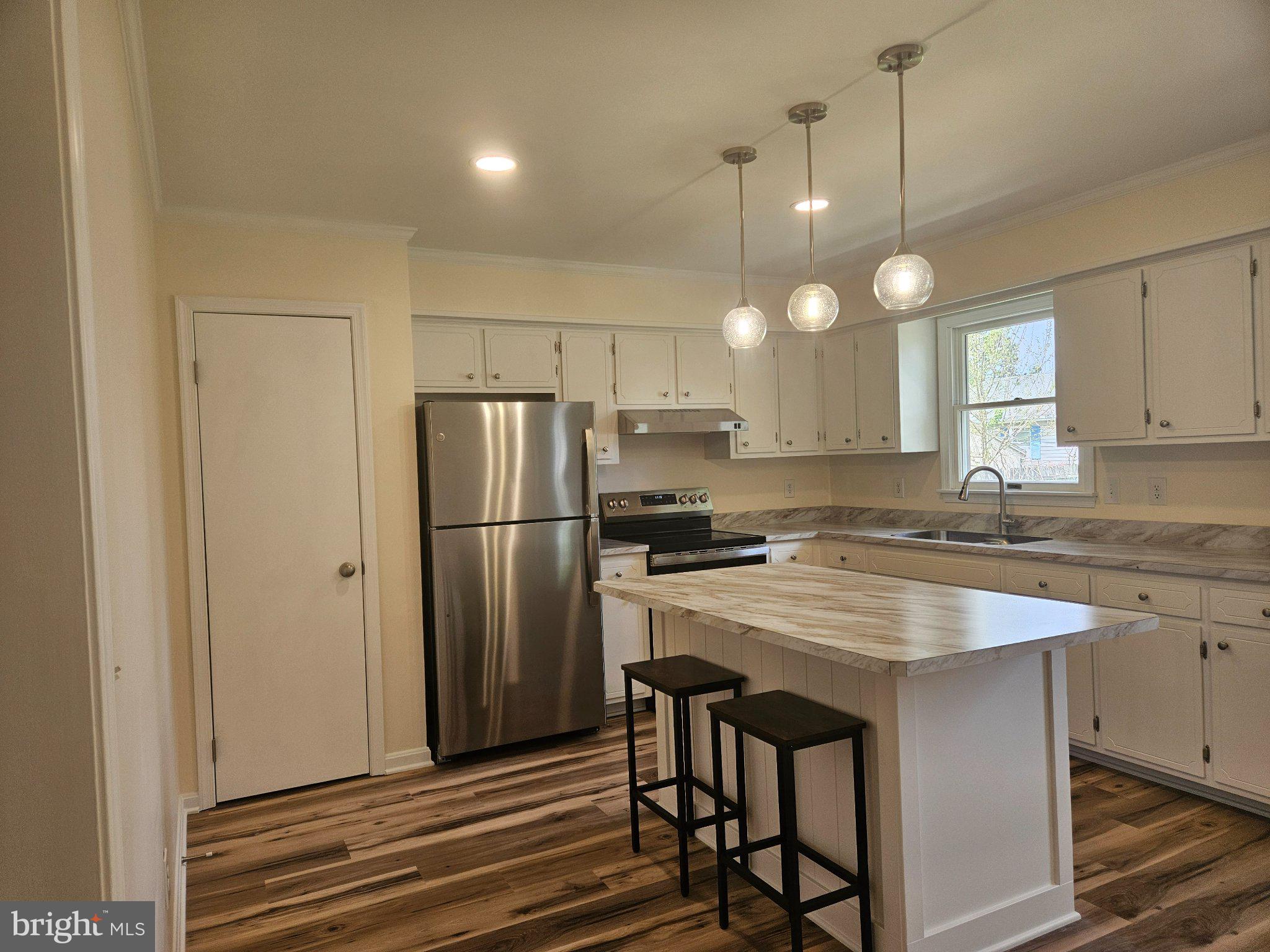 5 7th Street Ridgely, MD 21660 - Photo 5 of 12 Modern kitchen with sleek finishes.