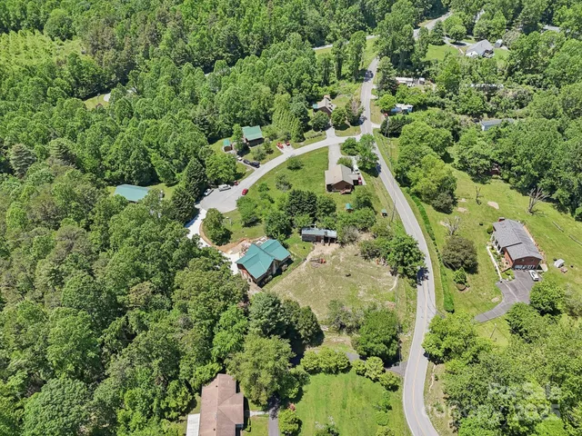 a view of a door and chair and table in the patio