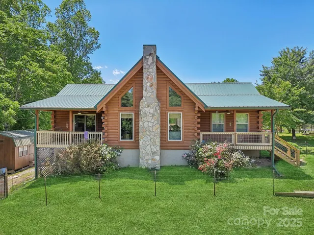 a view of backyard with green space