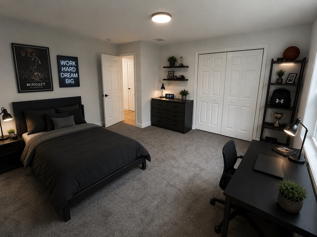 39 Lincoln Street, Unit A / B Webster, MA 01570 - Photo 27 of 33 a bedroom with a bed and furniture